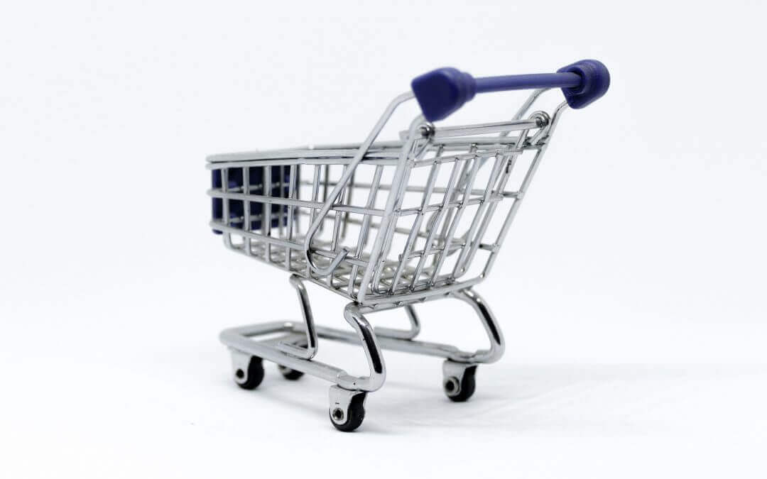 Empty and abandoned shopping cart made from metal.