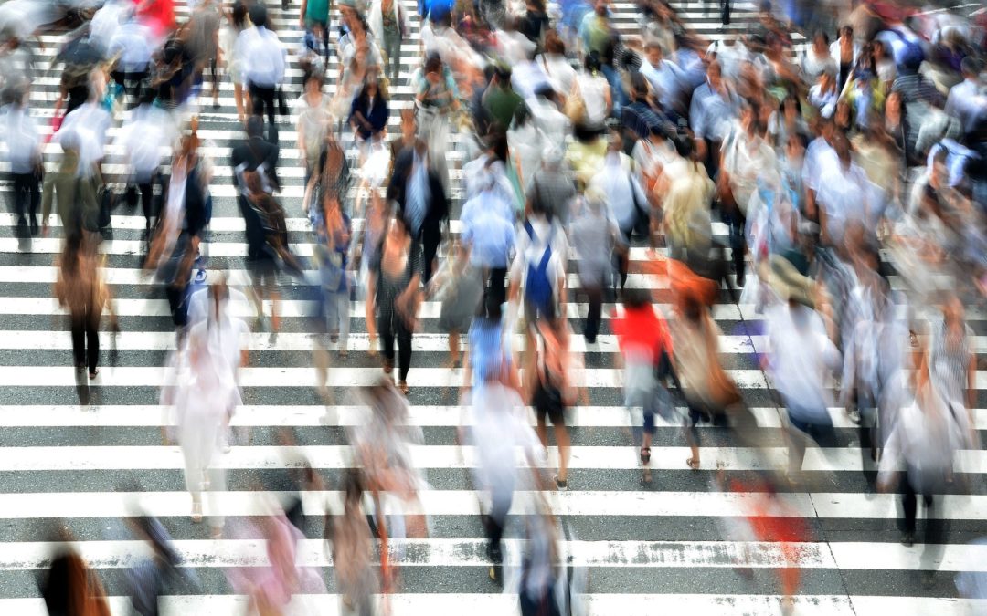 People crossing pedestrian walk