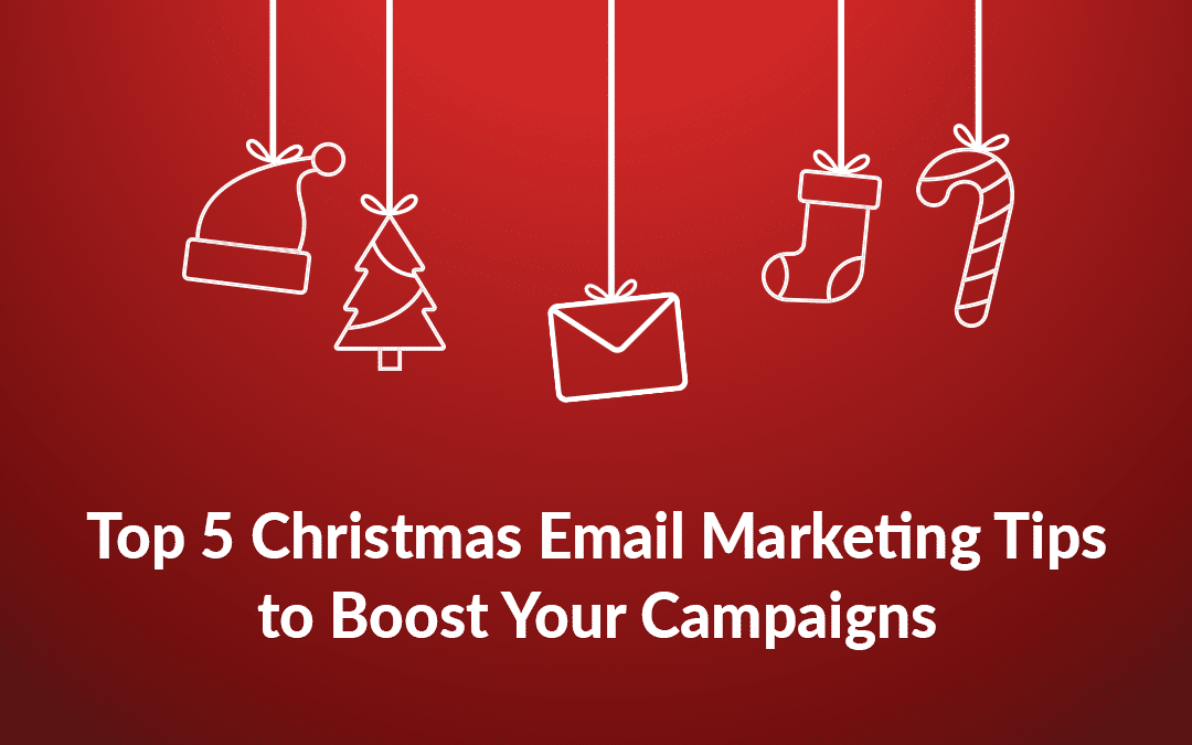 A Christmas setting where 5 objects hang on strings: Santa's hat, a Christmas tree, a letter as a symbol for email marketing, a sock and a candy.