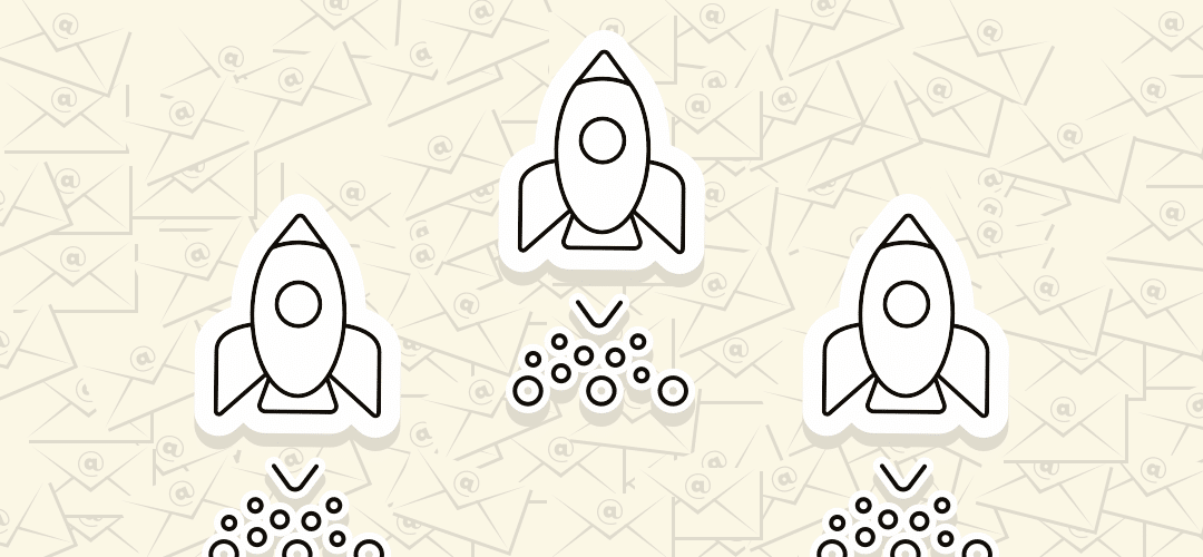 Three rocket drawings hovering over a bunch of envelopes symbolizing gamification in email marketing